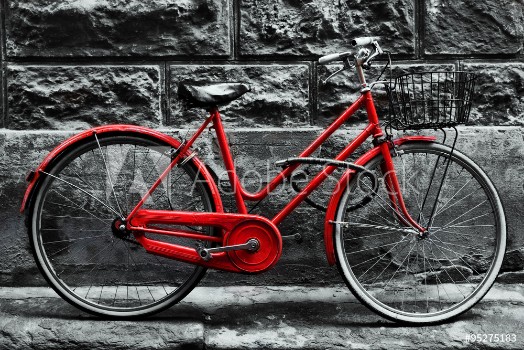 Picture of Retro vintage red bike on black and white wall